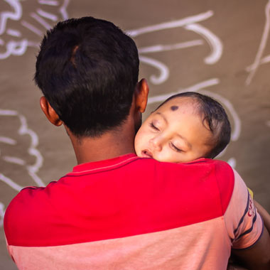 Man holding baby